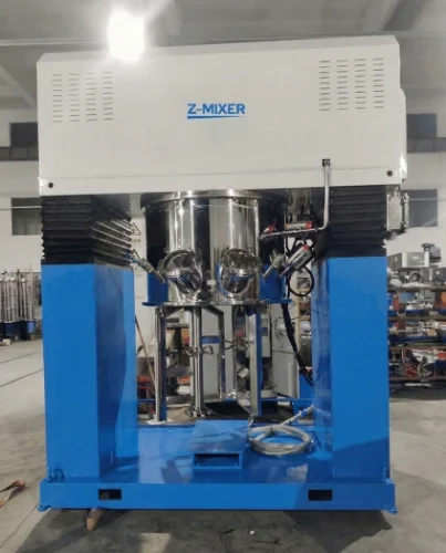 Double Planetary Dispersing Mixer combining low-speed planetary agitation with high-speed dispersion shafts for incorporating difficult powders into viscous liquids.