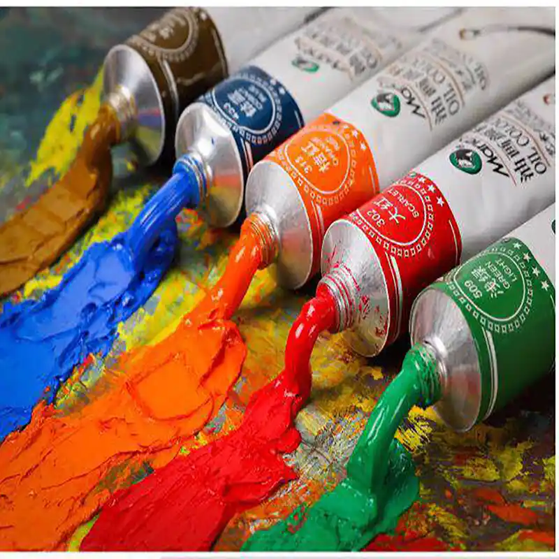 Industrial planetary mixer kneading heavy pigments with linseed oil to produce smooth, high-viscosity artist oil paints