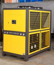 Chiller and plate heat exchanger connected to jacketed mixing tanks for butter oil temperature control